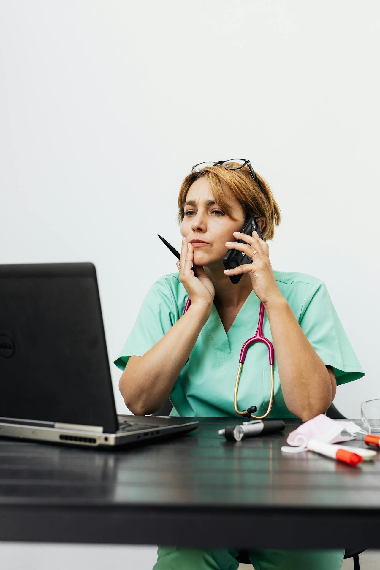 doctor sitting at computer